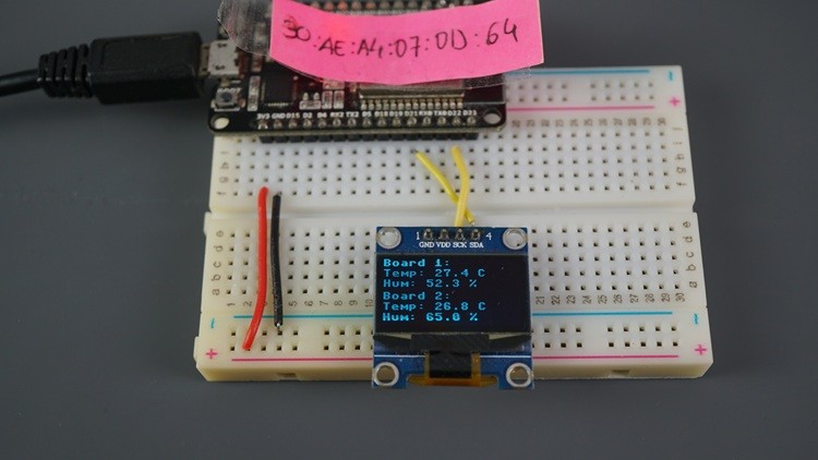 Приёмник ESP-NOW отображает данные от нескольких плат ESP32 на OLED-экране